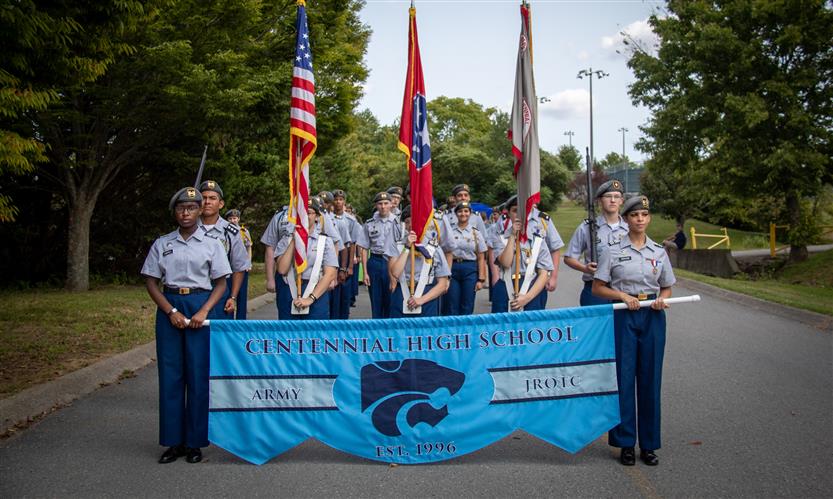 Students celebrate while on a homecoming parade float